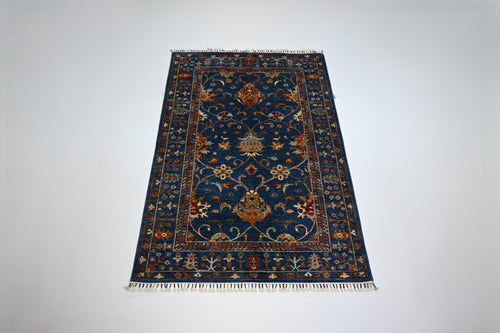 Sultani El Dokuma Halı | 181x122 cm | 35x40 İlmek | %100 Yün – Doğal Boya – Lacivert Zemin | Yeni Dokuma